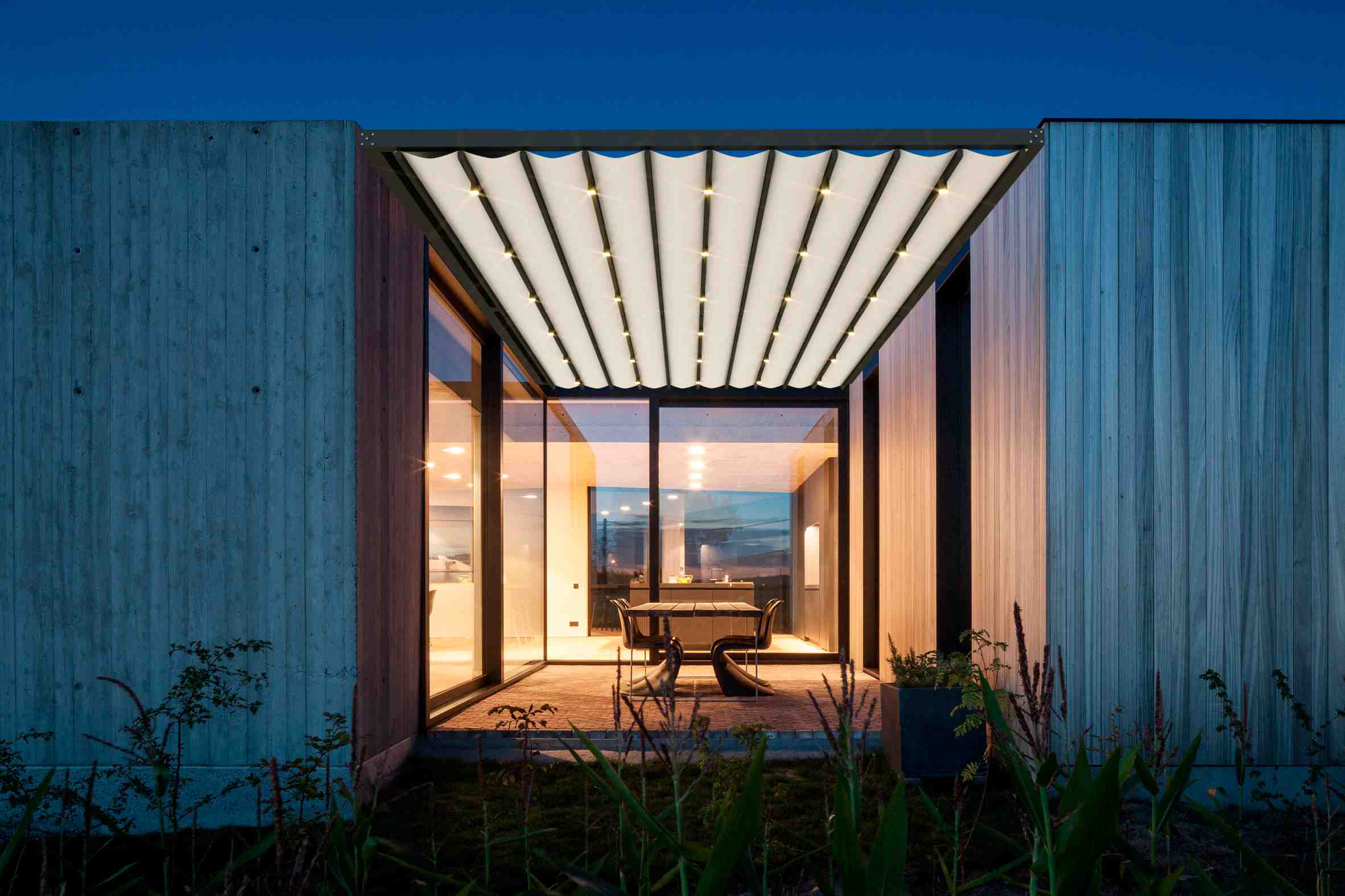 Romano pergola design by Anchor Industries, seamlessly integrated into outdoor walls.