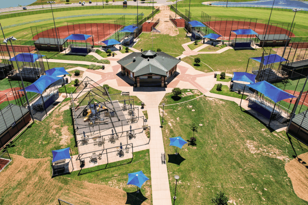 School bleacher shade structure by Anchor Industries providing UV protection, heat reduction, and durable coverage for students and spectators.