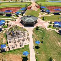 School bleacher shade structure by Anchor Industries providing UV protection, heat reduction, and durable coverage for students and spectators.