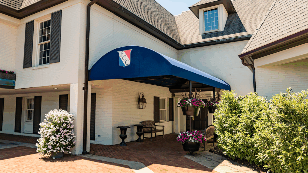 Commercial building entrance canopy by Anchor Industries enhancing curb appeal and functionality.