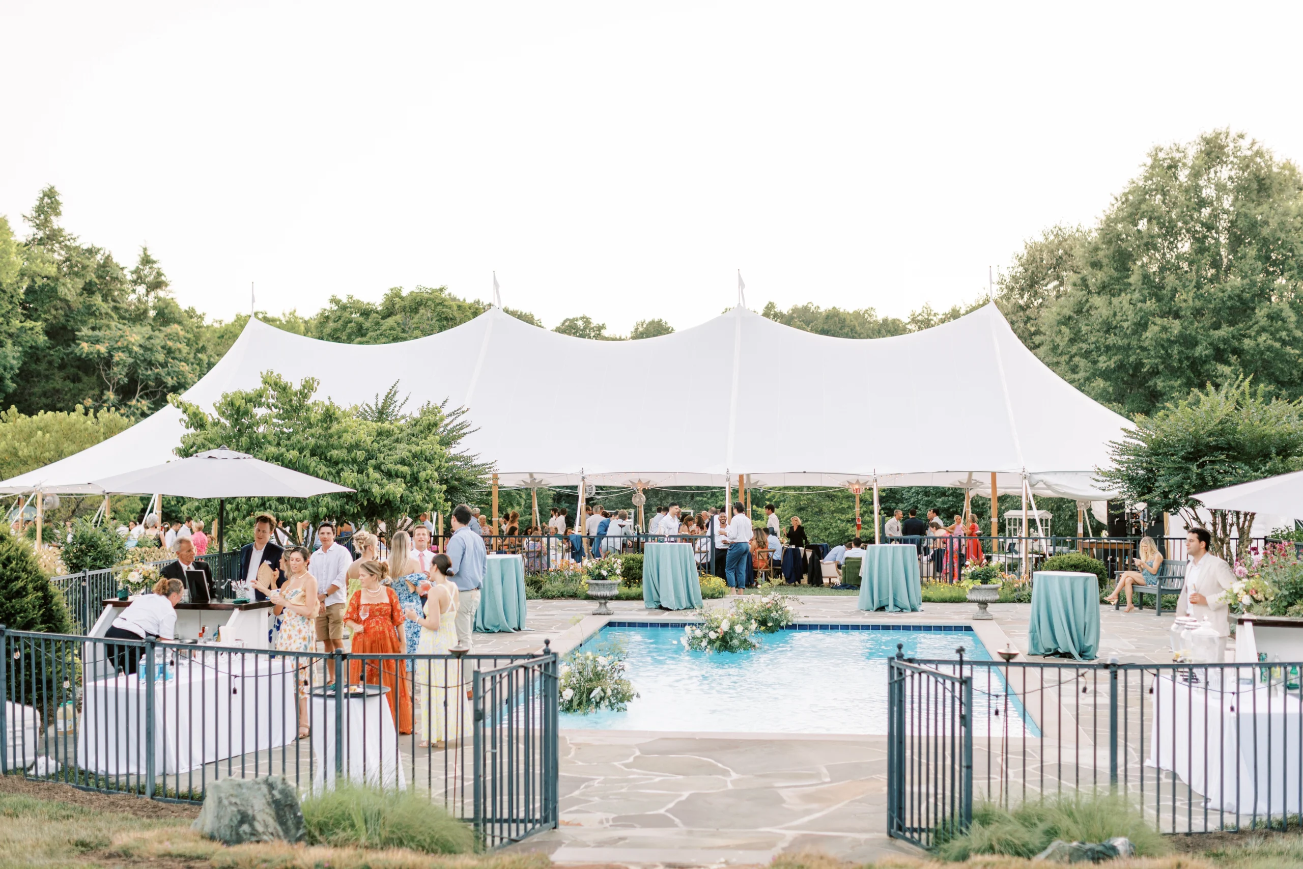 Anchor Industries white wedding tent with guests at outdoor reception