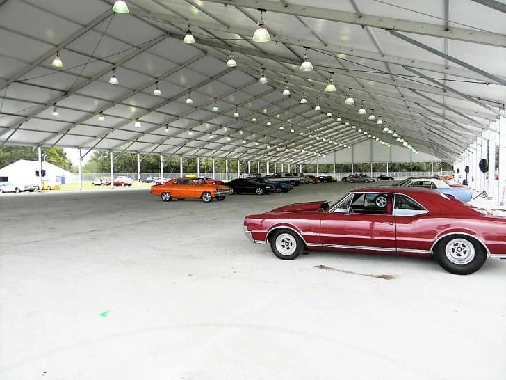 Anchor Industries clear span tent interior with cars on display