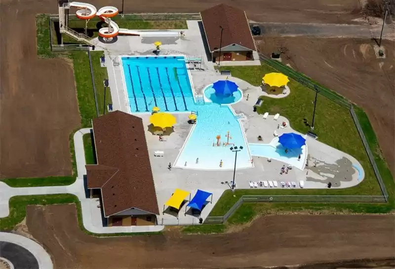 Anchor Industries aerial view pool shade umbrellas and water slides