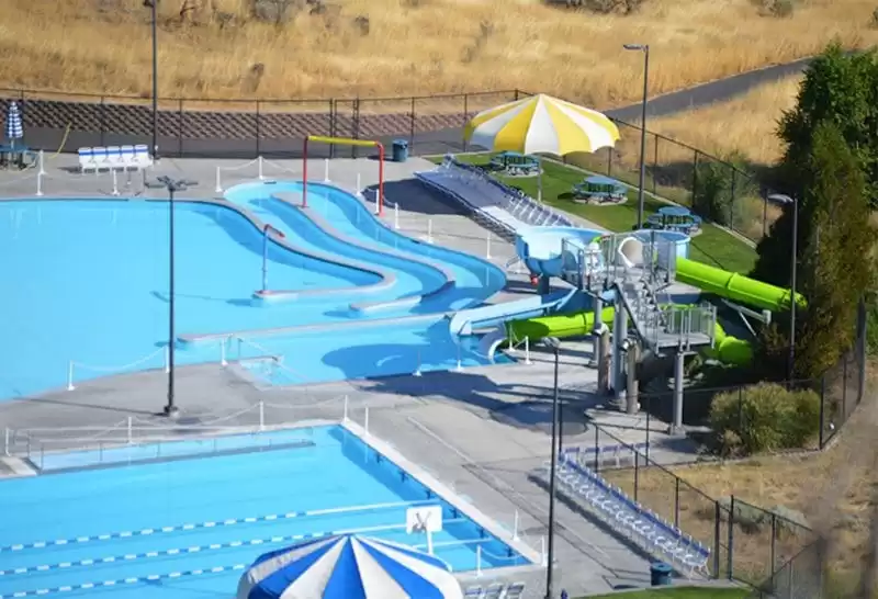 Anchor Industries pool shade structures at waterpark with slides