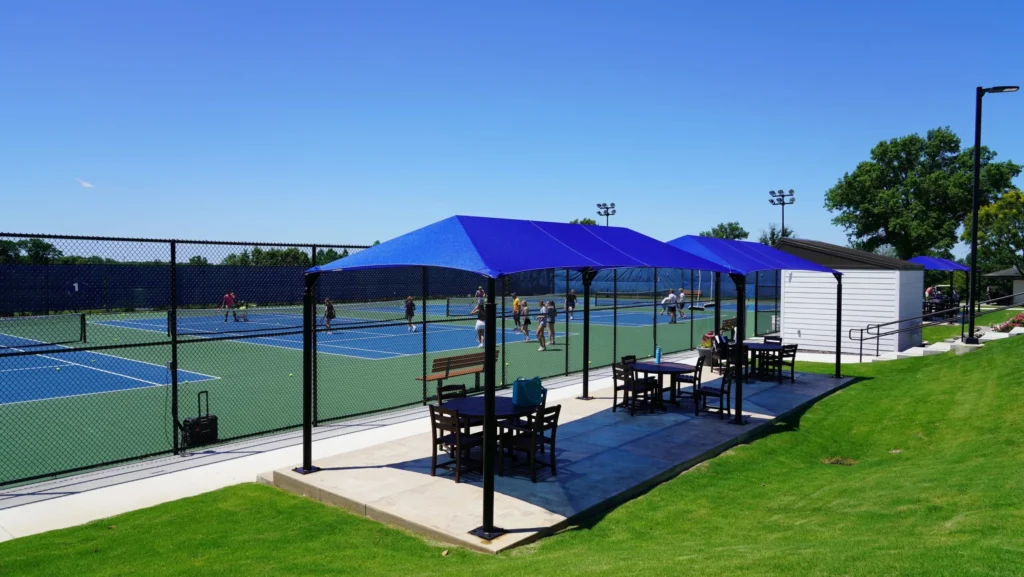 Anchor Industries blue shade structure at sports field