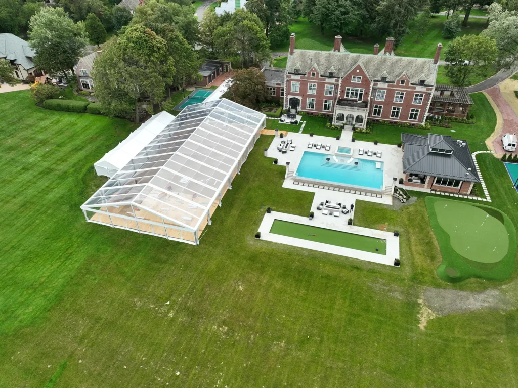 Transparent clear span tent installation at historic mansion by Anchor Industries