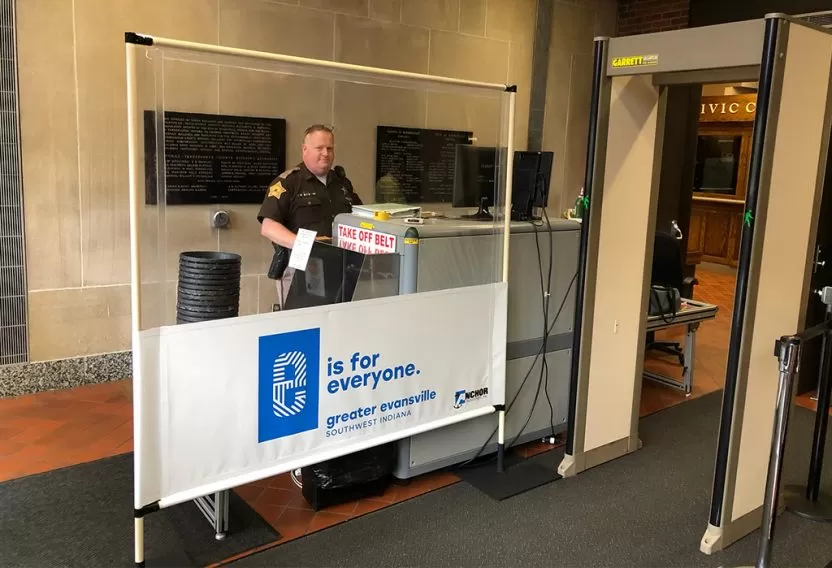 Anchor Industries protective barrier installed at customer service desk