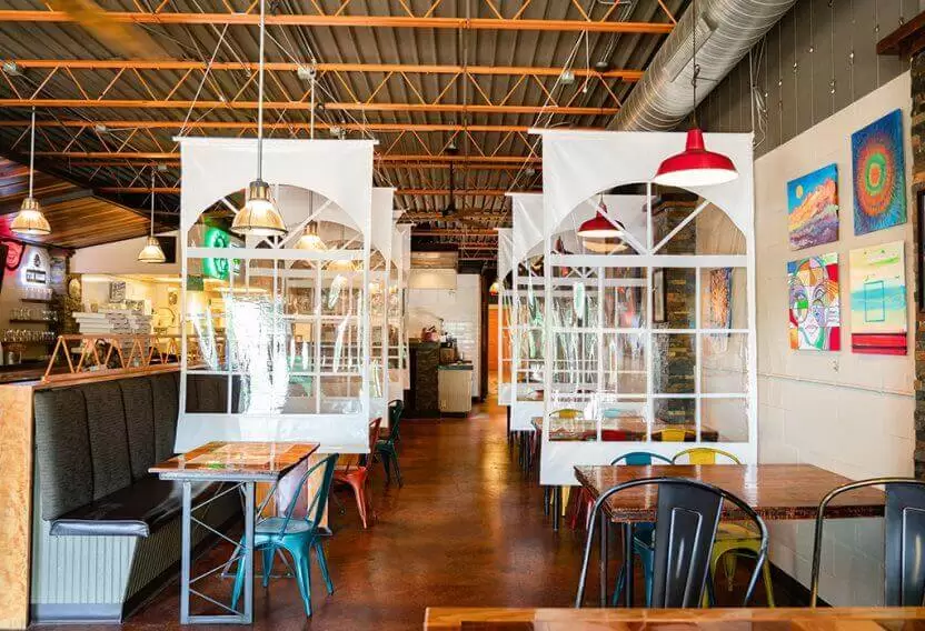 Indoor restaurant seating with Anchor Industries partition walls