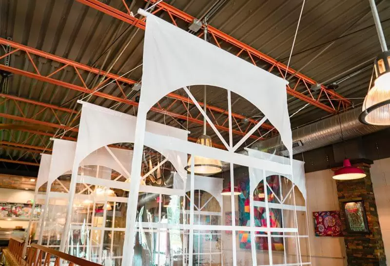 Anchor Industries white divider panels in commercial dining space