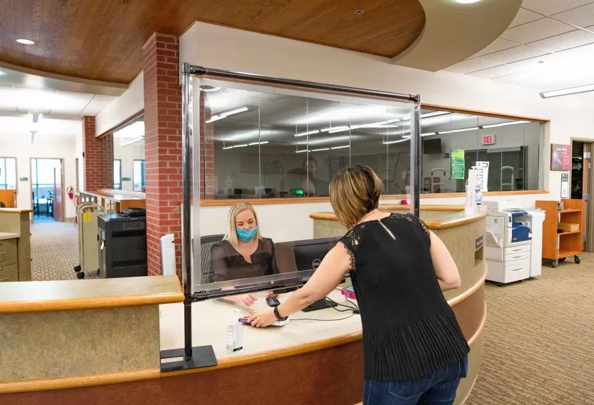 Reception desk with Anchor Industries protective divider panels